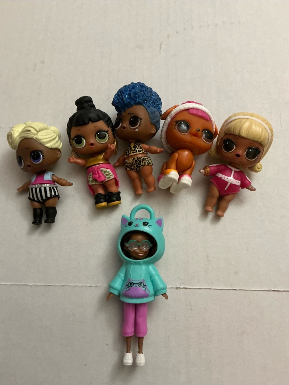 L.O.L. Surprise! Mini Doll Lot with Teal Hoodie, Pink & Blue Accents